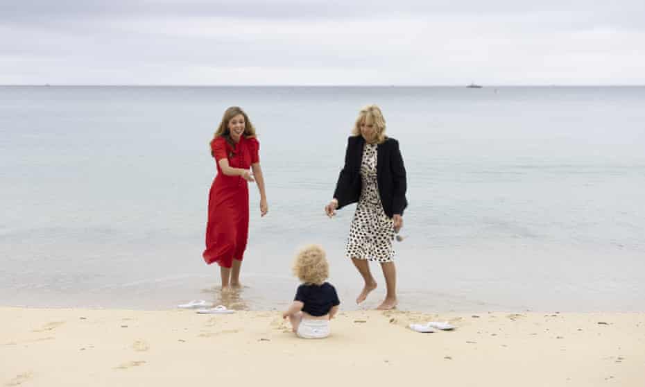 G7 Carrie Johnson and Jill Biden on beach - enlarge